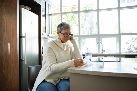 Mature woman alone at home