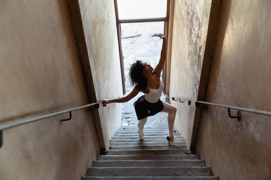Female dancer in an empty warehouse