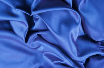 Draped biue satin fabric, background