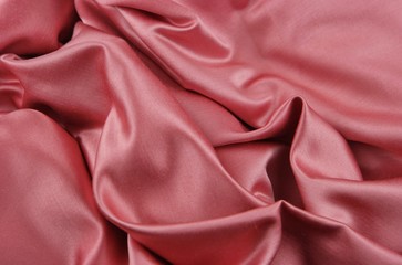 Draped pink satin fabric, background