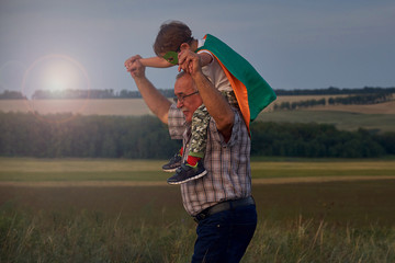 grandpa holding grandson. Family Relationship Between Grandfather and Grandson. Grandpa Teaching,