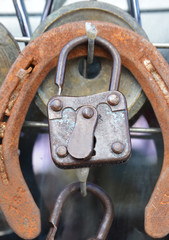 old and rusty padlock on background