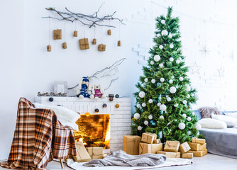 Fireplace and Christmas tree with presents in living room