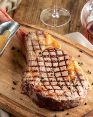 Grilled meat on the wooden board