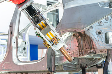 robot arm working in car factory