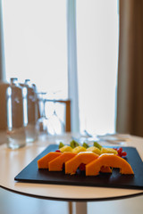 fresh fruits on a table in the hotel room