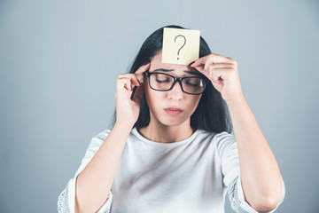 sad woman hand question mark