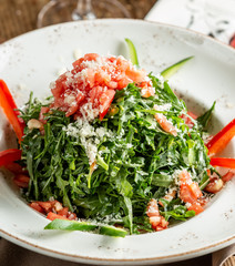 Vegetable salad with tomato and ruccola