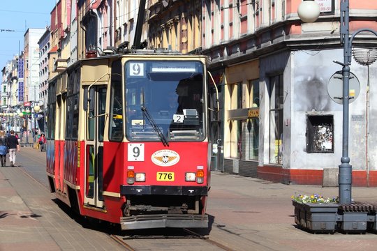 CHORZOW, POLAND - APRIL 7, 2018: People ride electric tram in Chorzow, Poland. Tramwaje Slaskie operates 28 lines, a network of total 181 km.