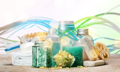 Obraz na płótnie Canvas Spa set: Aromatherapy bottles with scrub