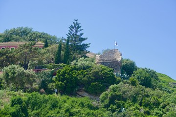 Fototapeta na wymiar Ruin of a Genoese tower on a cliff