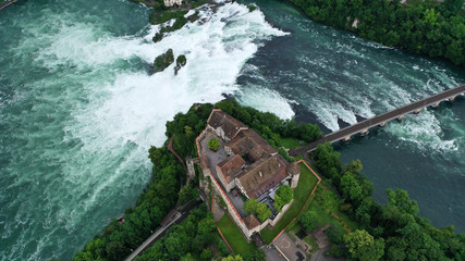 Aerial view of Rhine Falls (Rheinfall) biggest waterfall in Europe and Laufen castle near Schaffhausen, Switzerland, Germany.