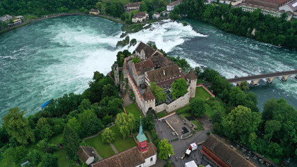 Rhine Falls (Rheinfall) waterfalls with Schloss Laufen castle, near Neuhausen and Canton Schaffhausen, Switzerland, Europe.