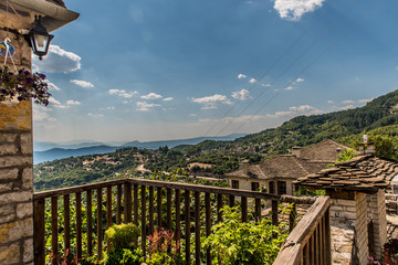 Balcony view at the mikro Papingo village, on a summer day, Ioannina, Greece
