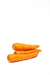 carrots isolated white background , portrait orientation natural color