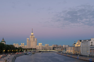 Fototapeta na wymiar Moscow river and Kotelnicheskaya skyscraper in the evening.