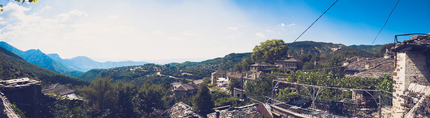 Naklejka na ściany i meble View of micro Papingon village on a summer day, Ioannina, Greece