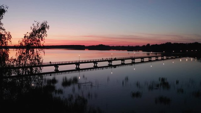 Evening, the wooden pedestrian bridge, the longest in Lithuania, over the artificial lake Sirvena near Birzai.