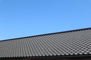 Fototapeta na wymiar 屋根と空