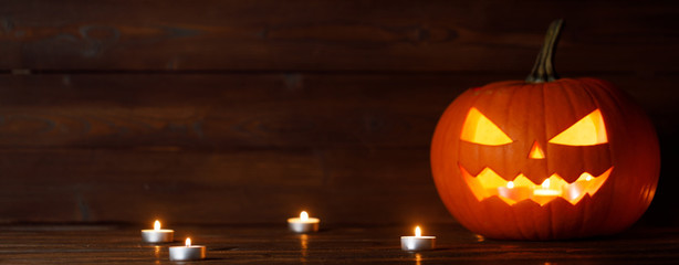 Fototapeta premium Halloween pumpkin and candles