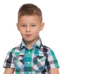 Portrait of little boy close-up. Isolated on white background.