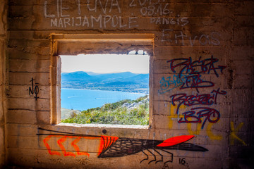 Graffiti wall with colorful paintes and beautiful view on Mallorca