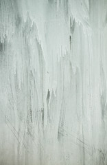 White paint on scratched glass, grungy background or texture