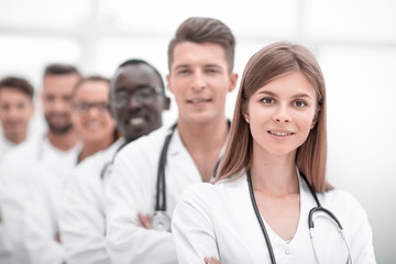 Fototapeta premium doctors team showing finger in camera