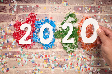 Happy New Year 2020. Symbol from number 2020 on bricks background