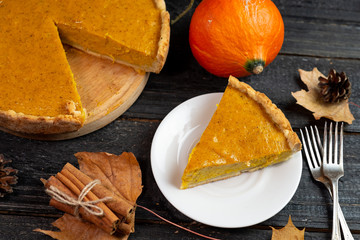 Traditional American pumpkin pie for thanksgiving in the fall. Delicious homemade cake