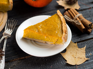 Traditional American pumpkin pie for thanksgiving in the fall. Delicious homemade cake