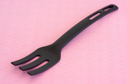 Black Plastic Fork On The Table