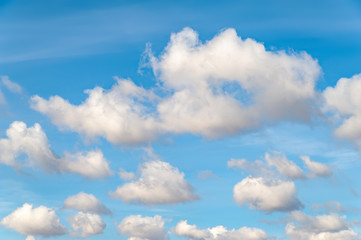 Fototapeta na wymiar Cold clouds in the blue sky in autumn day.