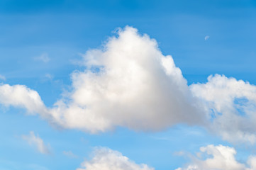 Close-up of clouds on a blue sky on a cold autumn day.