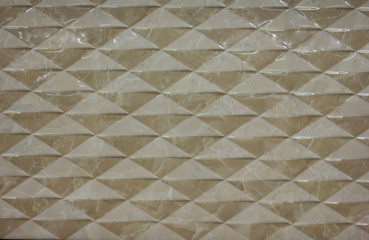 tile with small ornament cubes from triangles, beige rhombuses