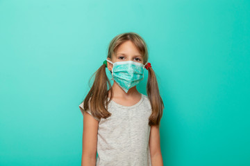 Child wearing syrgical mask as flu protection