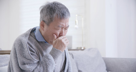 old asian man get a cold