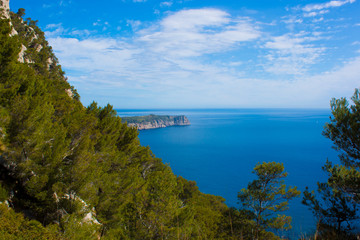 Mallorca panorama view with Mountains and green forest and blue sky and Mediterranen sea 