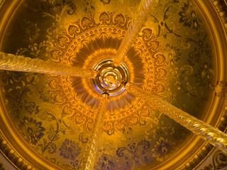 a antique chandelier with ornaments