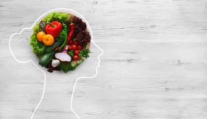 Foto auf Acrylglas Fresh vegetables in woman head symbolizing health nutrition © Prostock-studio