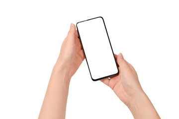 Smart phone in woman hands isolated on white background.  White screen. Copy space.