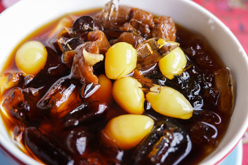 Sweet dessert made of herbs with ice,ching po leung gruel or water chestnut cold soup. It is good for summer and release your body heat.