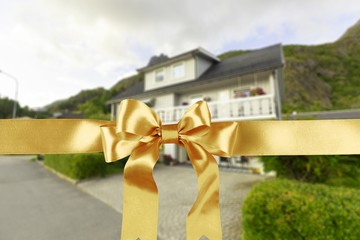 Golden ribbon wrapped in a bow