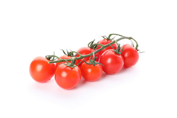 Branch of cherry tomatoes isolated on white background