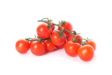 Branches of cherry tomato isolated on white background