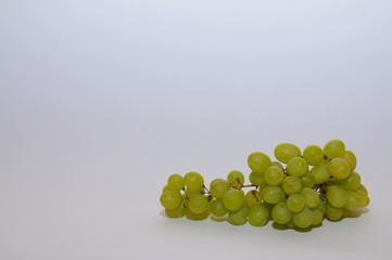 green grapes on a white background