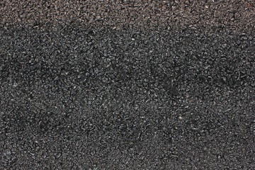 Black asphalt texture background. Asphalt road micro detailed texture.