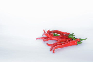 hot red chili peppers on a white background