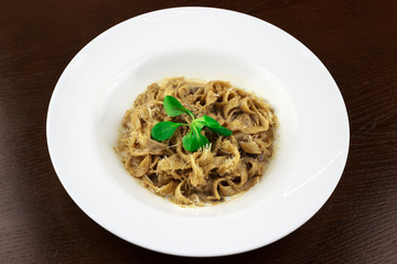 pasta with mazzarella cheese in a plate
