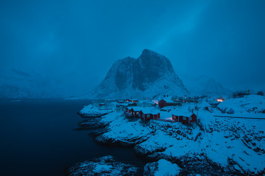 Red houses and beautiful mountain in Stunning Norway
